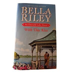 With this kiss by Bella Riley grand central publishing isbn 9780446584227